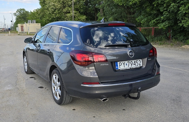 Opel Astra cena 25500 przebieg: 239000, rok produkcji 2014 z Poznań małe 277